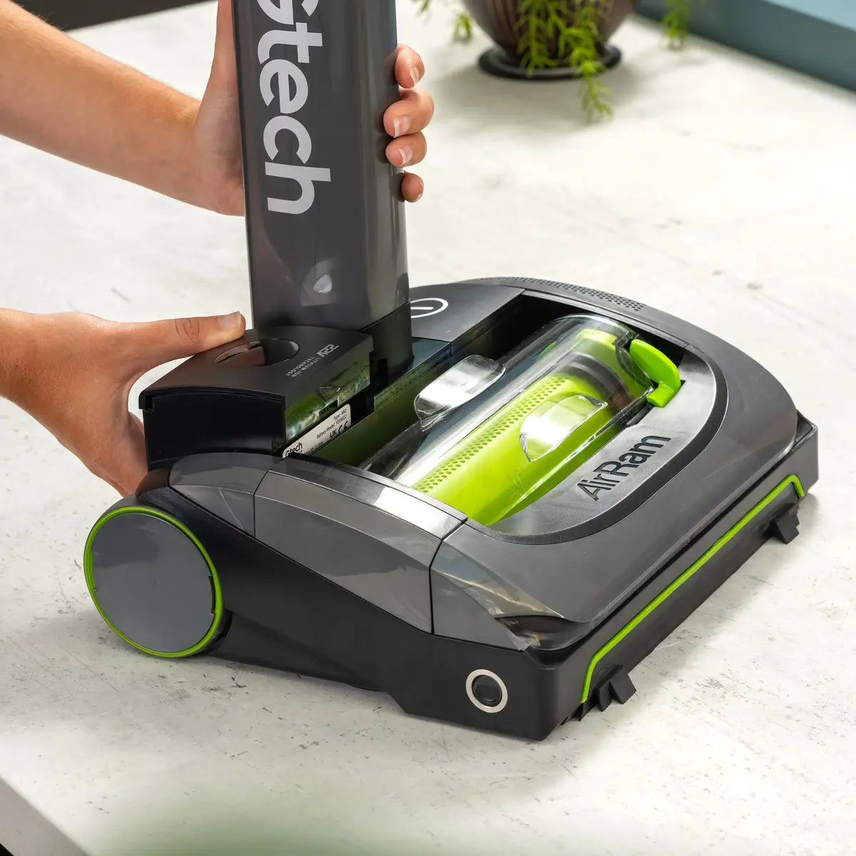 Battery being removed from Gtech AirRAM 2 cordless vacuum cleaner