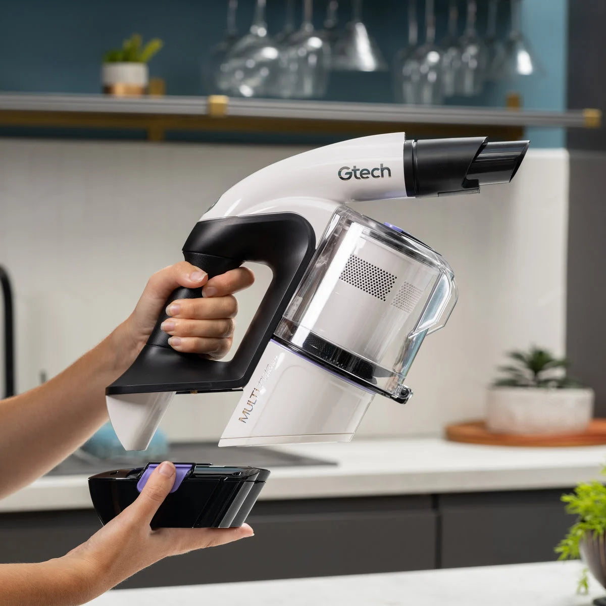 Multi Platinum handheld vacuum shown on a side view with battery removed.