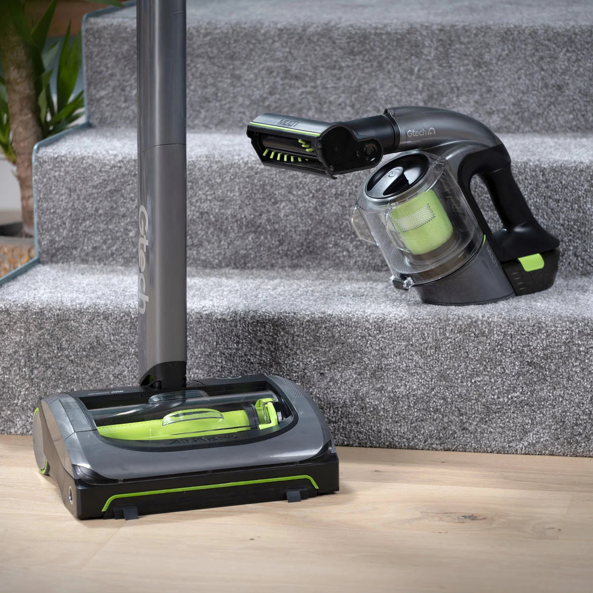 System bundle including the AirrAM 2 and Multi cordless vacuum position on the base of the stairs.