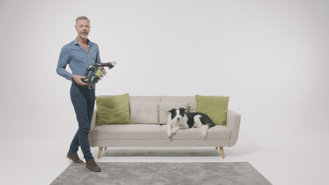 Man using Gtech Handheld  Multi K9 best car Vacuum